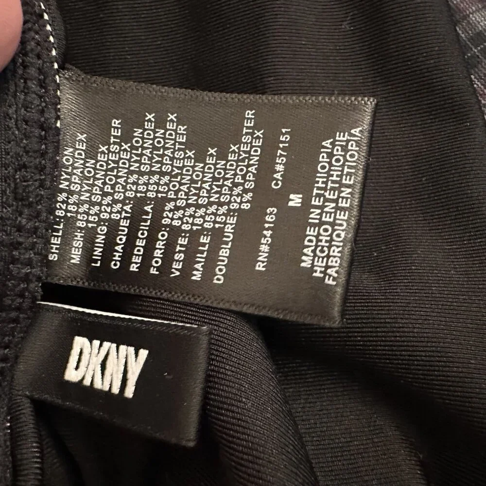 DKNY Black Lowcut One Piece Suit‎